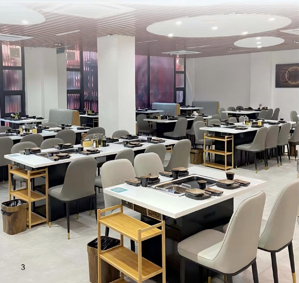 Smokeless BBQ grill integrated into a commercial restaurant table