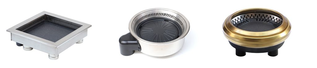 Commercial smokeless BBQ grill integrated into restaurant table