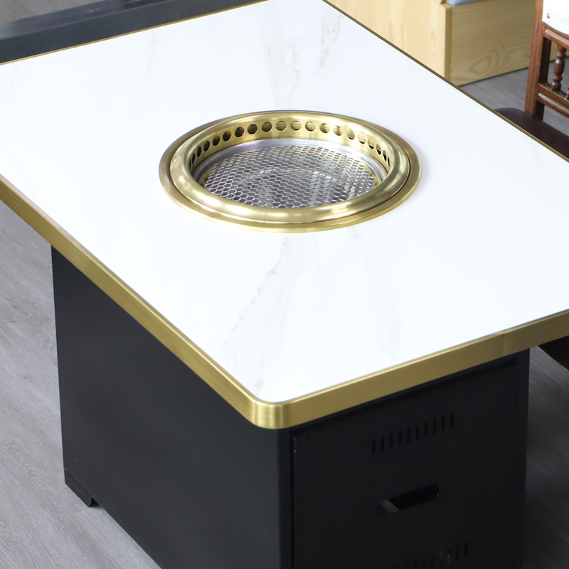 Custom rock slab restaurant table with built-in BBQ grill